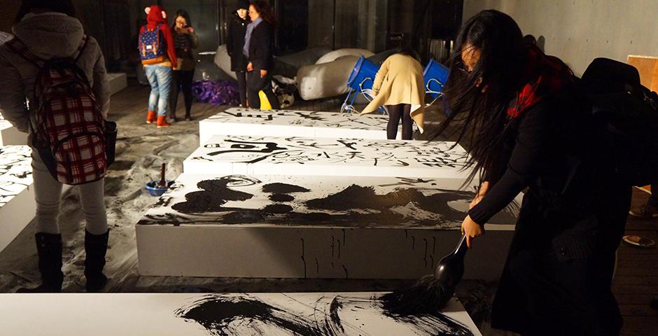 Fifteen studio art students selected by Jian-Jun Zhang and Barbara Edelstein collaborated in the installation of their piece, "Vestiges of a Process: Flowing Ancient Poem," at the Long Museum on November 26 (Photos by: NYU Shanghai)