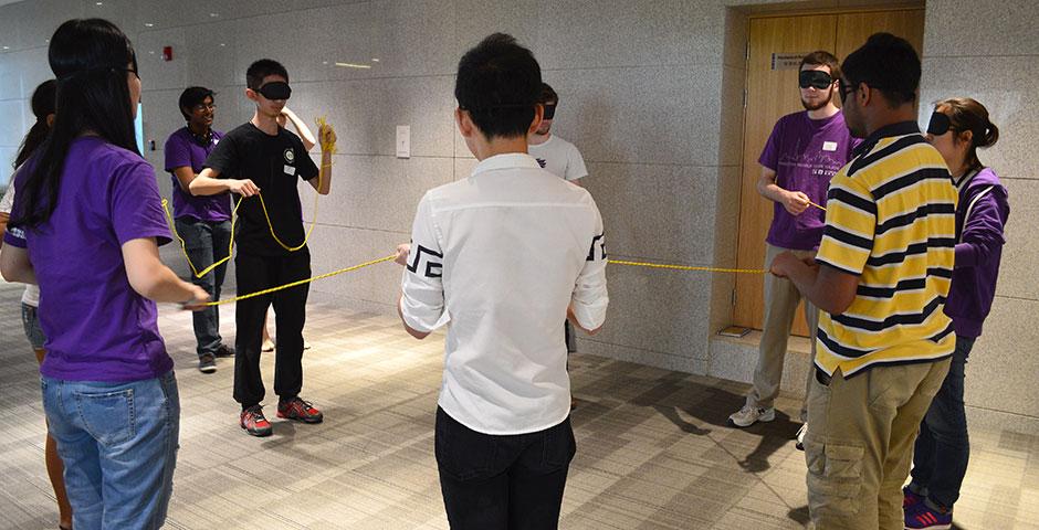 The Orientation Ambassadors participate in &quot;Blind Circle,&quot; a team building activity. April 25, 2015. (Photo by Shelly Lu &amp; Joyce Tan)