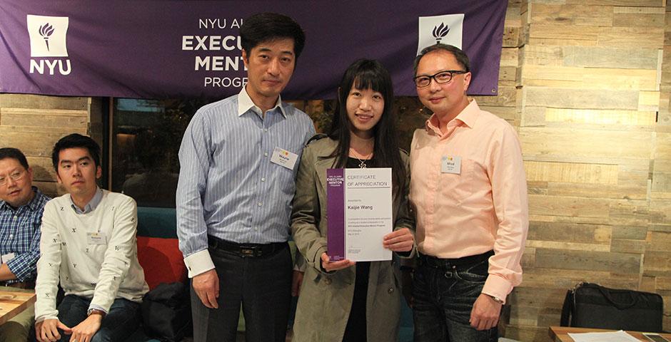 The NYU Alumni Executive Mentor Program held its end-of-semester appreciation dinner at naked Bite in Puxi, where student mentees read aloud thank you letters to their mentors; all participants were awarded certificates of appreciation. Several new alumni were welcomed to act as mentors for next year&#039;s program. May 8, 2015. (Photo by Tingting Wang)