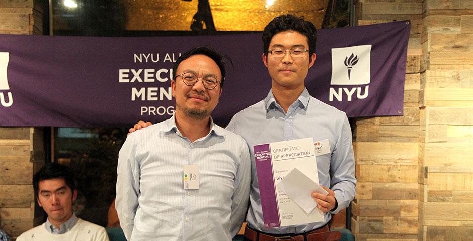The NYU Alumni Executive Mentor Program held its end-of-semester appreciation dinner at naked Bite in Puxi, where student mentees read aloud thank you letters to their mentors; all participants were awarded certificates of appreciation. Several new alumni were welcomed to act as mentors for next year&#039;s program. May 8, 2015. (Photo by Tingting Wang)