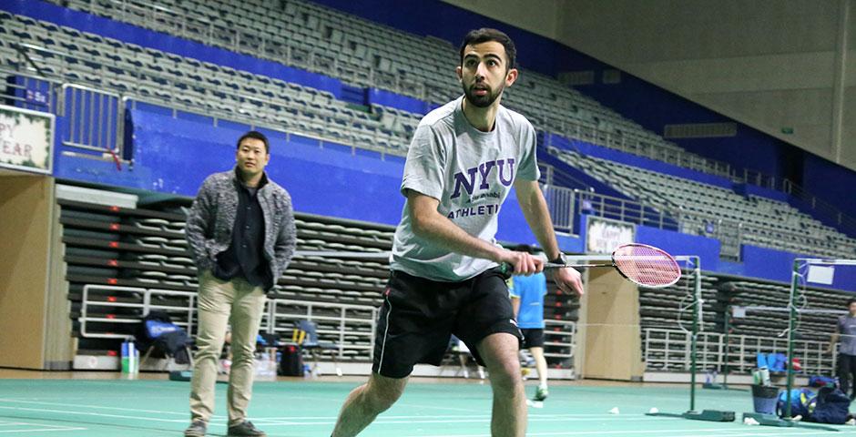 Students compete in the final round of the Intramural Badminton Tournament at Yuanshen Sports Centre Stadium. March 12, 2015. (Photo by Kevin Pham)