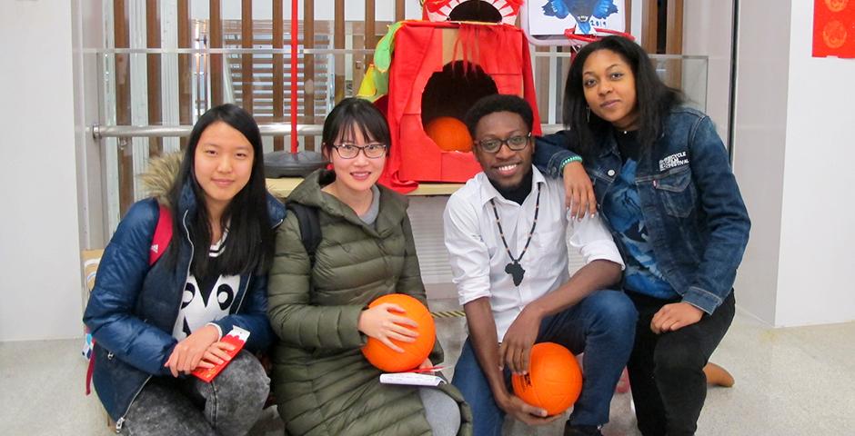 In the spirit of Chinese New Year, students were able to catch up with friends after winter break at the Welcome Back party, celebrating with traditional red envelopes packed with sweet goodies, and challenging friends with a creative basketball hoop dragon’s head game. (Photos by: NYU Shanghai)