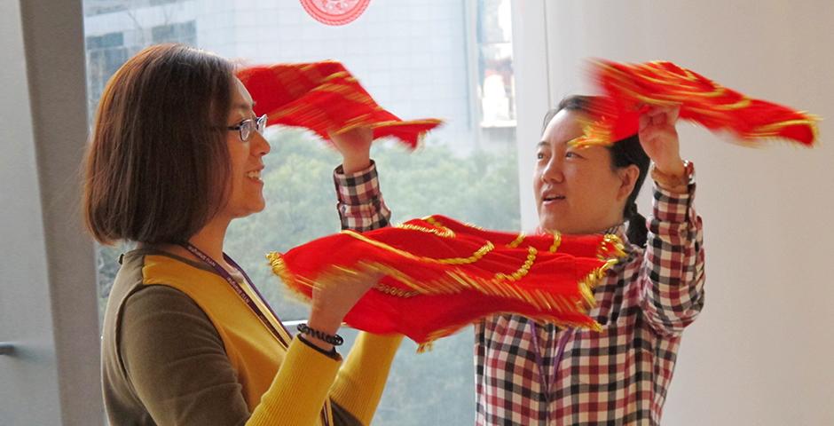 Student activities marking the celebration of Chinese New Year included paper-cutting craft workshops, games and scroll painting. (Photo by: NYU Shanghai)