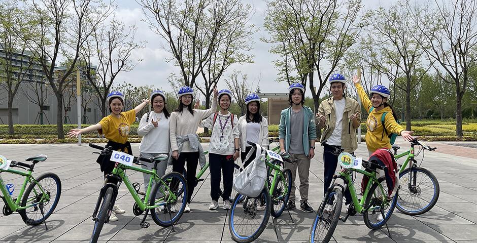 [Beyond the Magnolia House] April 15 2023, a beautiful sunny spring day, a group of 10 first-year students joined the Biking &amp; Picnic event. The biking group biked through World Expo Park along the Huangpu River and met up with the picnic group at Qiantan Leisure Park Camping Zone (near Youcheng Park Gate 6). Students then enjoyed snacks, beverages, and McDonald’s as well as playing fun board games and frisbees on the grass.