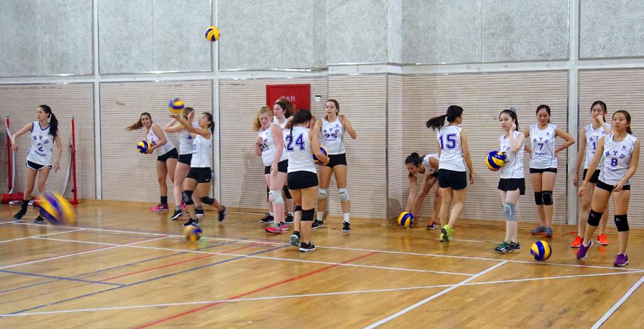 The NYUSH Women&#039;s Volleyball team took to court against ENCU, losing out to the partner school on October 20. The team warms up. (Photos by: Nacole Abram)