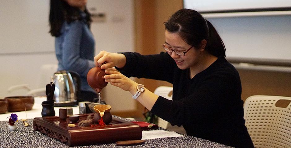 Steeped in tradition, students honed their tea ceremony technique at an April 13 workshop hosted by Food &amp; Festivals and Heath and Wellness. (Photo by: NYU Shanghai)