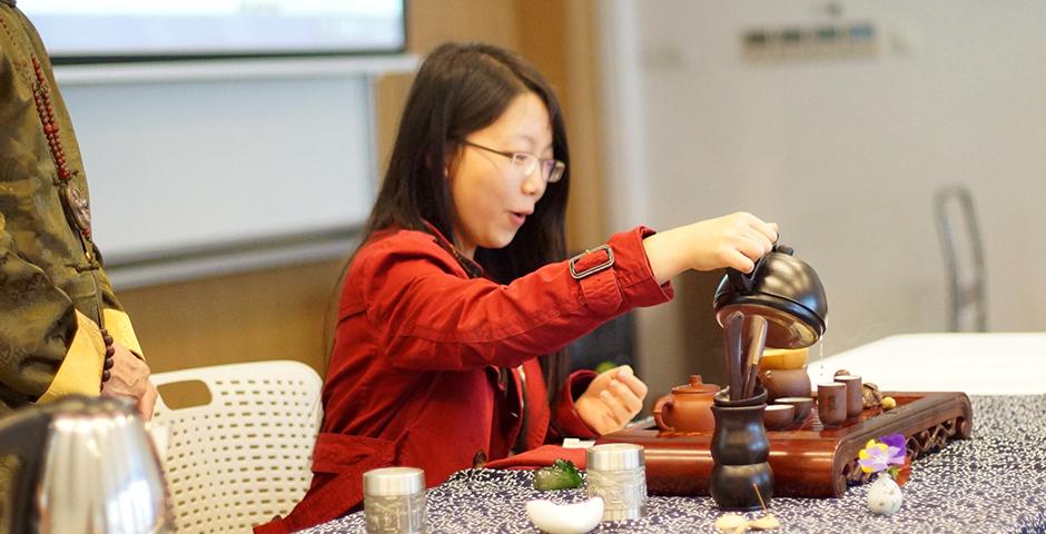 Steeped in tradition, students honed their tea ceremony technique at an April 13 workshop hosted by Food & Festivals and Heath and Wellness. (Photo by: NYU Shanghai)