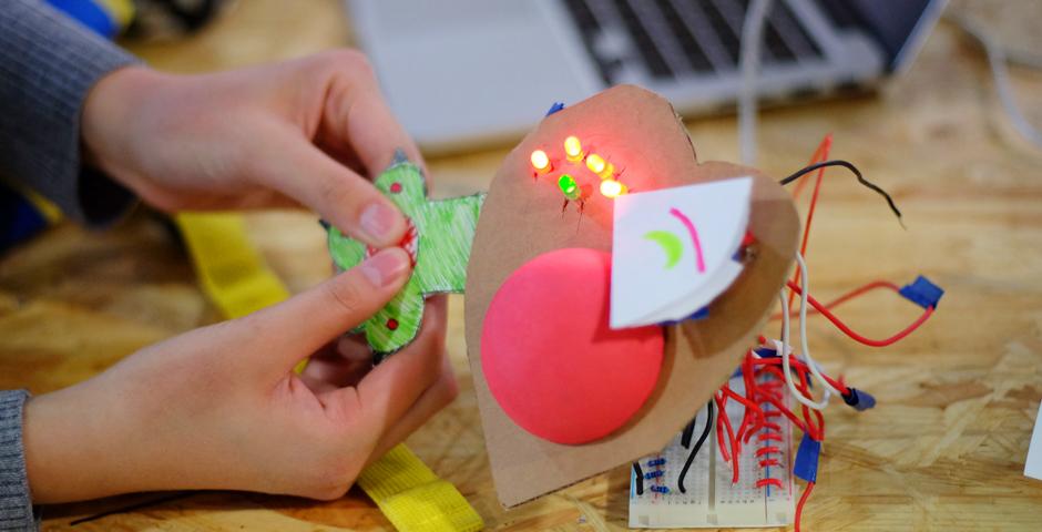 On March 10, IMA hosted a “Stupid Pet Trick” show, where students were challenged to create simple, physically interactive devices using basic skills learned in class. The crowds were entertained with everything from dancing dumplings to devices that detected hand sweat. (Photo by: NYU Shanghai)