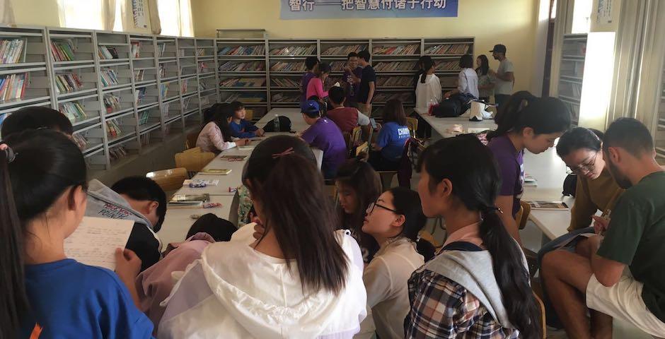 On Sept 30, NYU Shanghai volunteers also visited a local elementary school, working with children in groups to create and perform short English plays. (Photo by Harrison Cheng).