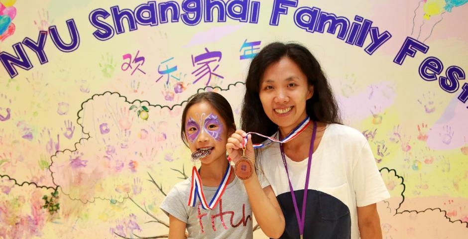 Families of NYU Shanghai faculty and staff gathered on September 10 for a morning of activities ranging from hula hoop challenges to competitive team calligraphy. (Photo by: NYU Shanghai)