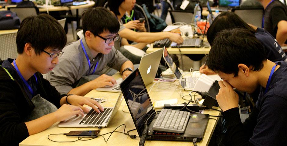 250 of the world's top student programmers competed in HackShanghai, a 24-hour coding marathon. November 15-16, 2014. (Photo by Sunyi Wang)
