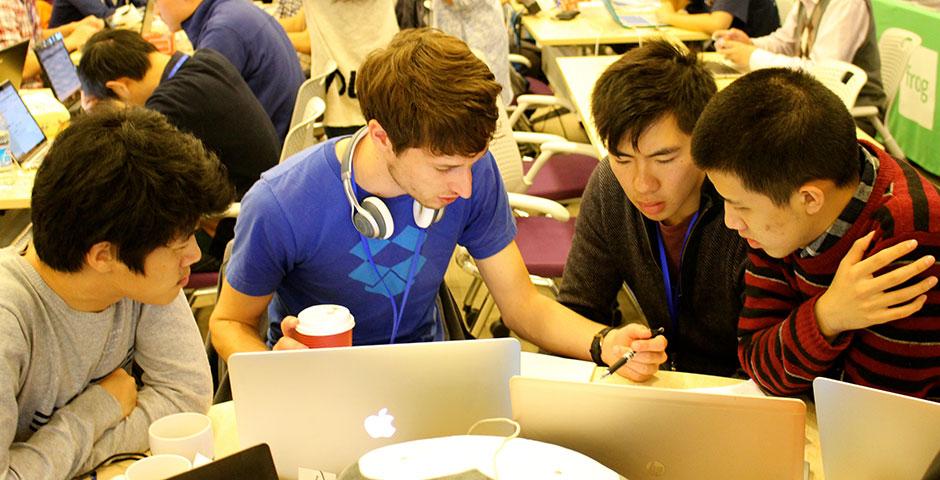 250 of the world's top student programmers competed in HackShanghai, a 24-hour coding marathon. November 15-16, 2014. (Photo by Sunyi Wang)