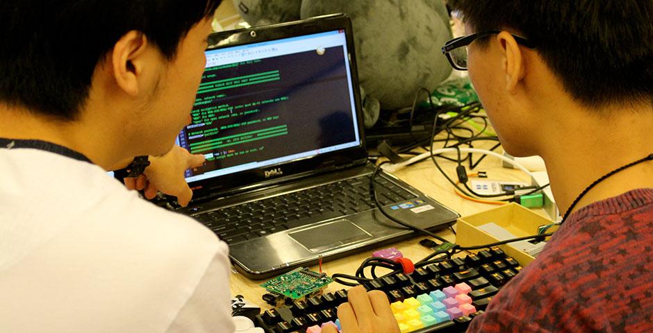 250 of the world's top student programmers competed in HackShanghai, a 24-hour coding marathon. November 15-16, 2014. (Photo by Sunyi Wang)
