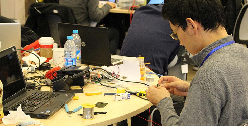 250 of the world's top student programmers competed in HackShanghai, a 24-hour coding marathon. November 15-16, 2014. (Photo by Sunyi Wang)