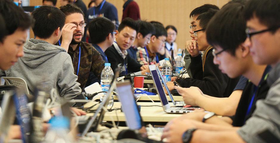 250 of the world's top student programmers competed in HackShanghai, a 24-hour coding marathon. November 15-16, 2014. (Photo by Kadallah Burrowes)