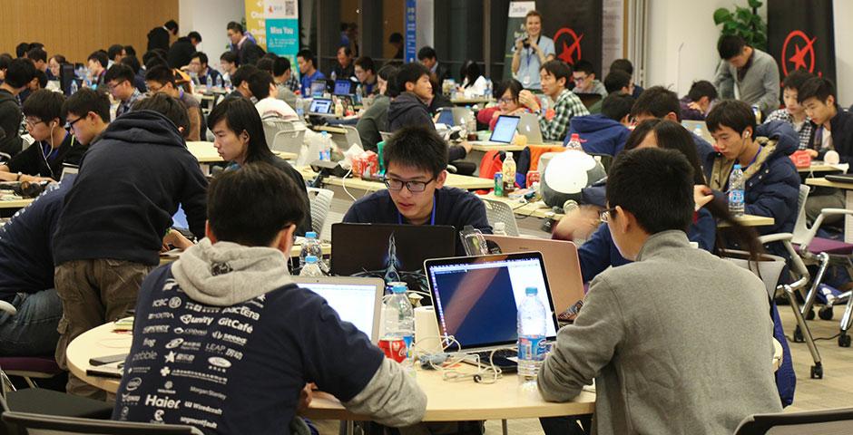 250 of the world's top student programmers competed in HackShanghai, a 24-hour coding marathon. November 15-16, 2014. (Photo by Kadallah Burrowes)