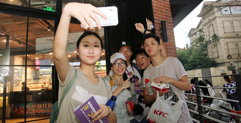 It looks like this team stopped for longer than to just take a group shot in front of a western restaurant. (Photo by: NYU Shanghai)