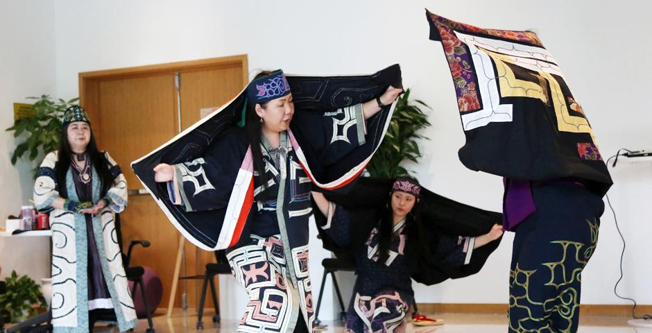 Saron-rimse is a dance in which performers play cranes--the gods of the wetlands of Hokkaido. The older dancers represent adult cranes teaching their young how to dance.