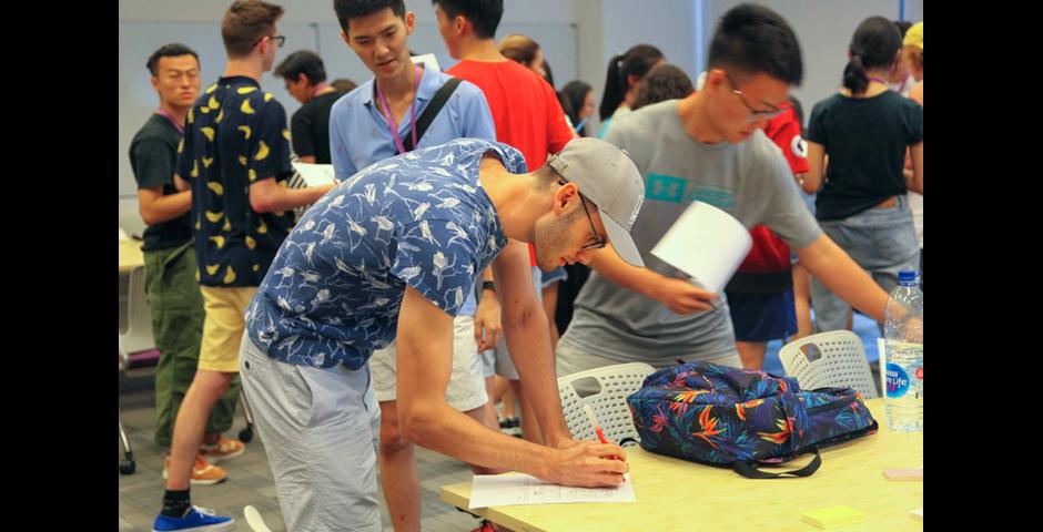 Members of the Class of 2023 race to find out more about their new classmates in the First Year Dialogue activity “Social Identities,” where students are encouraged to think about identity in many layers from individual personality to cultural and social background. The First Year Dialogue continues throughout the first month of the semester and is designed to give students the tools to create their own community and support networks, said Shelly Lu, Assistant Director of New Student & Diversity Programs.
