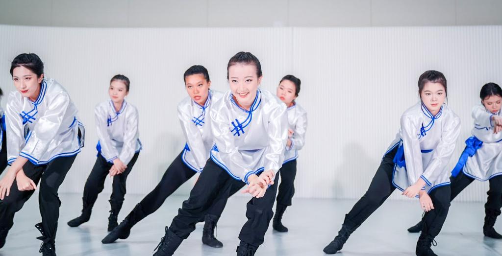 Dances of Northern China class performing a Mongolian dance titled “Windchaser” taught and choreographed by Associate Arts Professor of Dance Tao Siye.