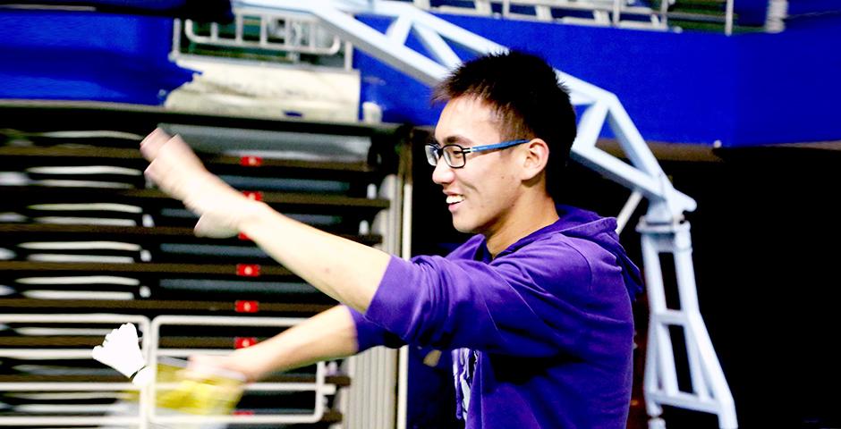 Badminton Insanity club members participate in the weekly free play events at YuanShen Stadium, October 16, 2014. (Photo by Annie Seaman)