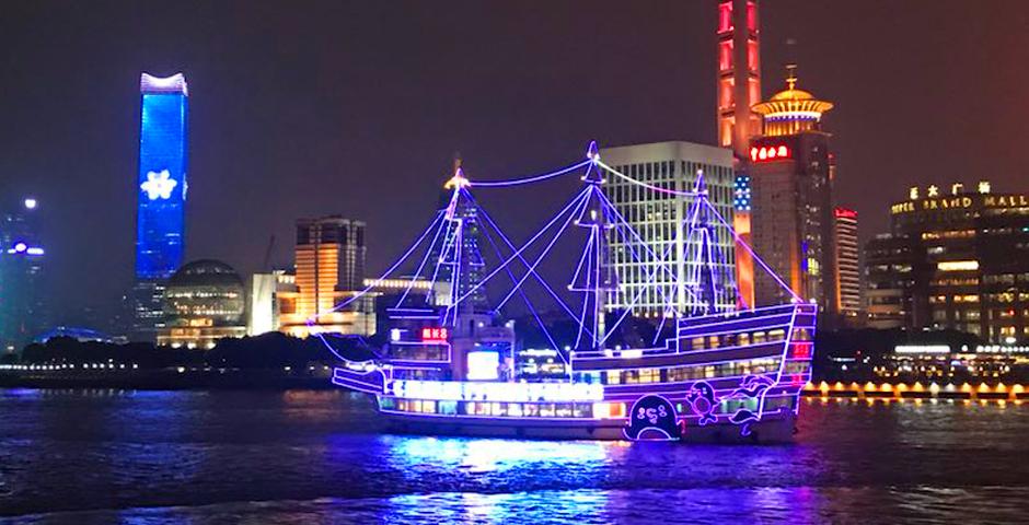 On May 22, the Oriental Pearl Tower shone violet for the graduating class of 2018. （Photo by: NYU Shanghai）