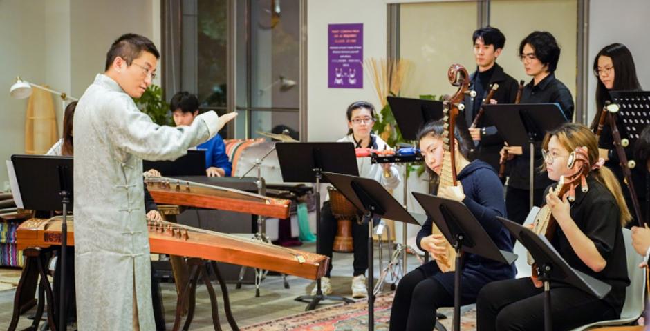 Assistant Professor of Computer Science Gus Xia, who is also a professional Chinese flute player and former assistant conductor at the Chinese Music Institute of Peking University, conducts the NYU Shanghai Chinese Music Ensemble in a rendition of “Jiuge,” or “Toasting Song.”