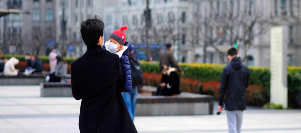 father holding a baby