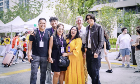 Jonathan Engalla (second from left) and Ignacio Cowles (far right) reunited on NYU Shanghai campus with their families