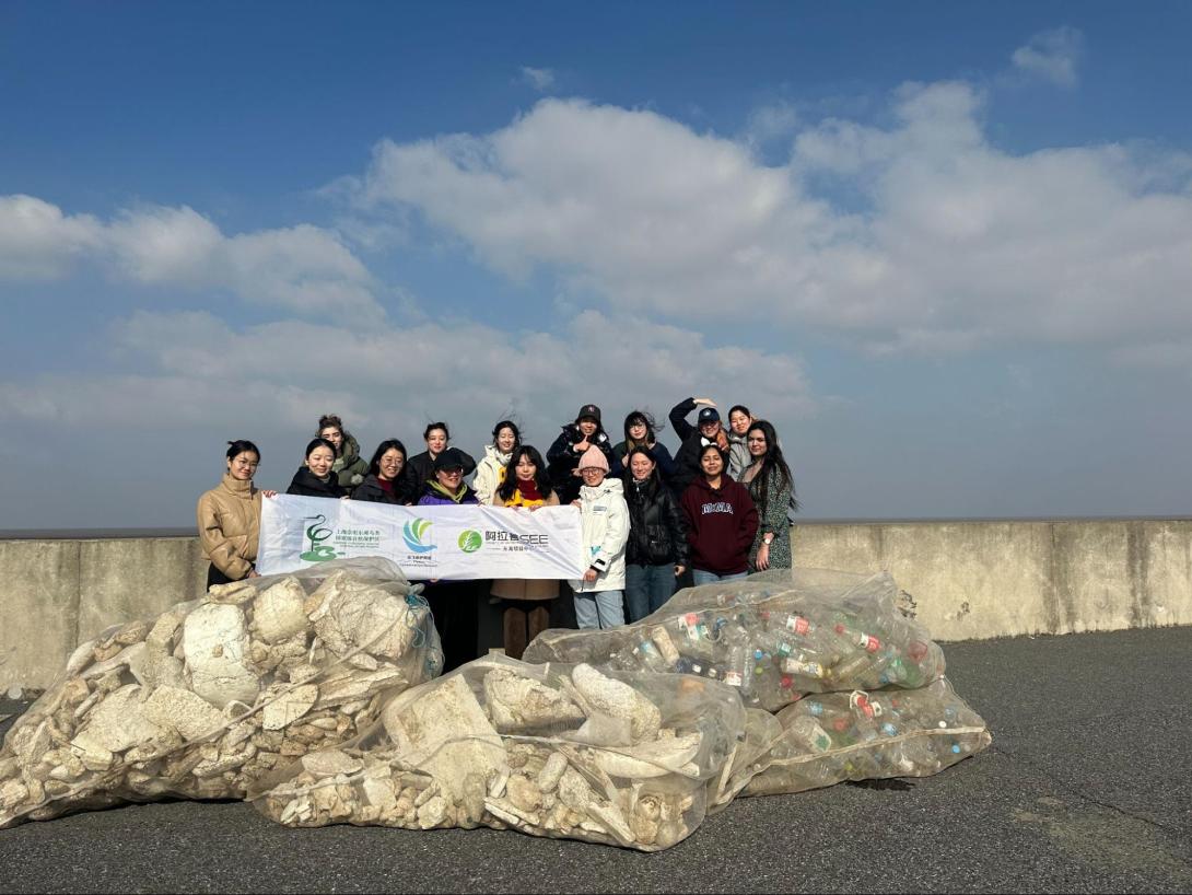 a group pic of students after they picked up trash