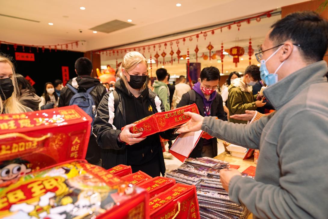 Student receives Chinese New Year gift bag